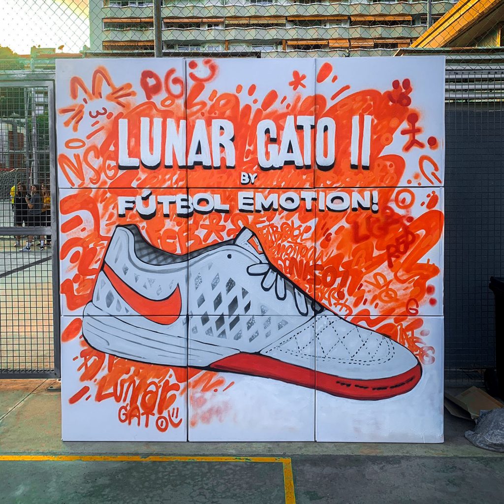 Sesión de live painting profesional donde se crea un mural realista de una zapatilla Nike utilizando técnicas de graffiti y spray.